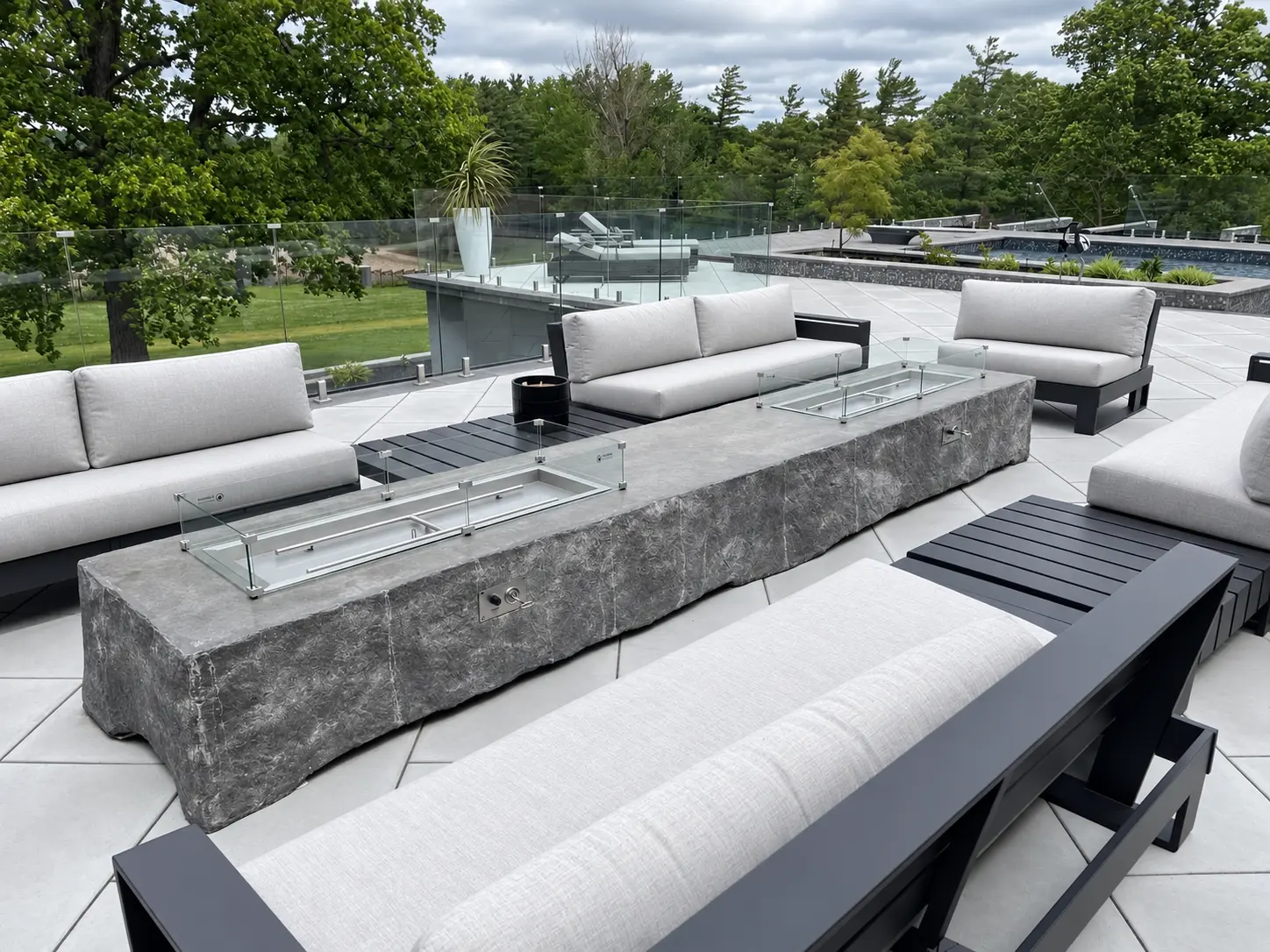 Bedrock custom sculpted fire table in a contemporary outdoor lounge